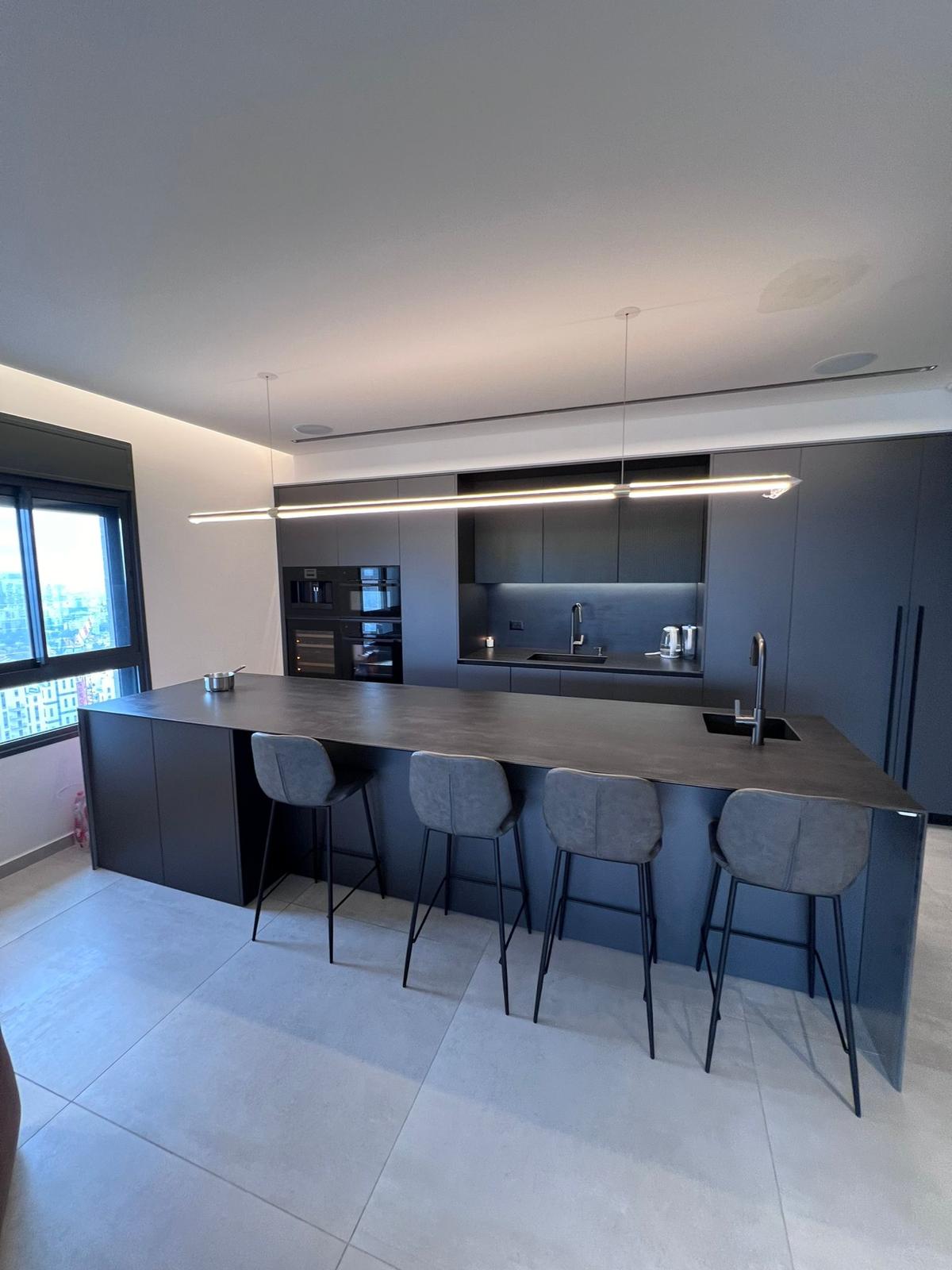 Modern kitchen island with wooden details